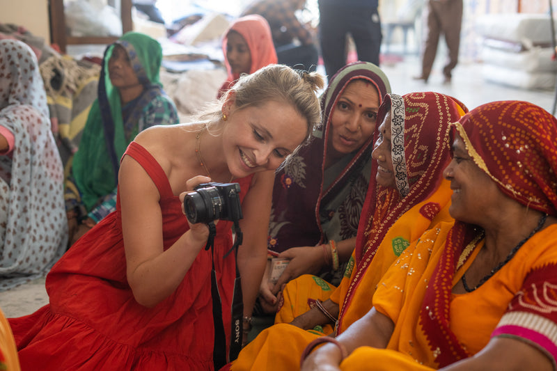 Pelican House founder Bella Gent with artisans in India