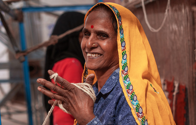 Pelican House artisans in India creating bespoke rugs